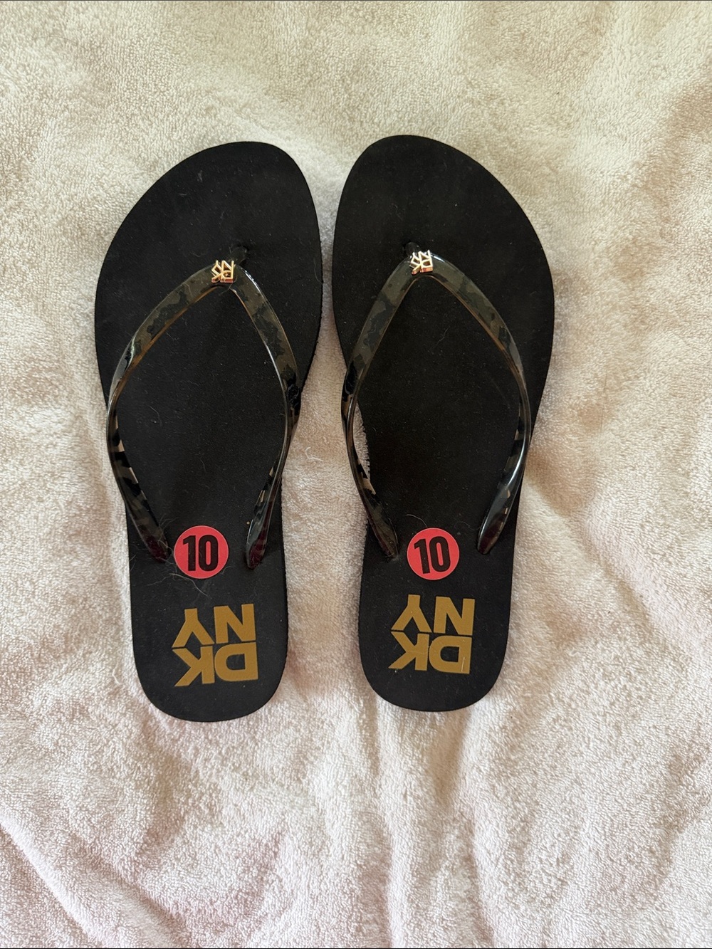 DKNY Women’s 10  Black Flip Flop Sandals with Gold Logo Accent